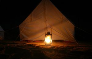 tent-lit-by-a-lamp